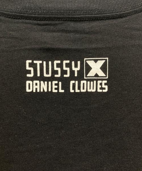stussy（ステューシー）stussy (ステューシー) DANIEL CLOWES スペースウォーTシャツ ブラック サイズ:XLの古着・服飾アイテム