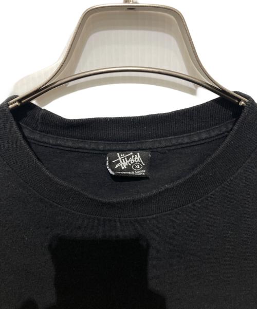 stussy（ステューシー）stussy (ステューシー) UNION (ユニオン) ラスタロゴTシャツ ブラック サイズ:XLの古着・服飾アイテム