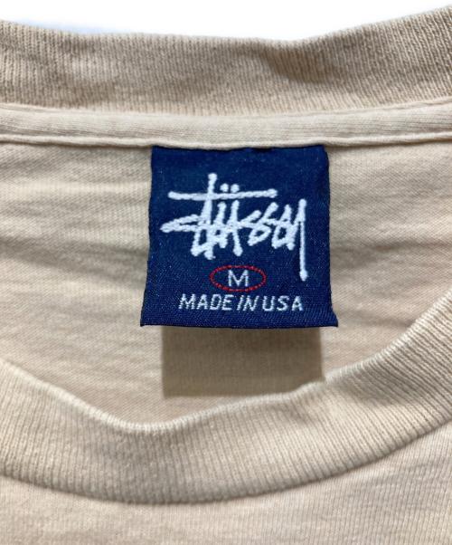 stussy（ステューシー）stussy (ステューシー) グラフィックロゴTシャツ ベージュ サイズ:Ｍの古着・服飾アイテム