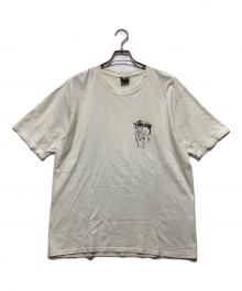 stussy（ステューシー）の古着「トランプシャッフルTシャツ / プリントTシャツ」｜ベージュ