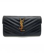 Yves Saint Laurentイヴサンローラン）の古着「カサンドラ YSLロゴ Vステッチ キルティング フラップ ロングウォレット 長財布」｜ブラック