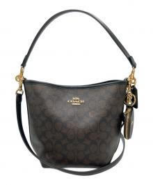 COACH（コーチ）の古着「シティ バケット バッグ・シグネチャー キャンバス」｜ブラウン