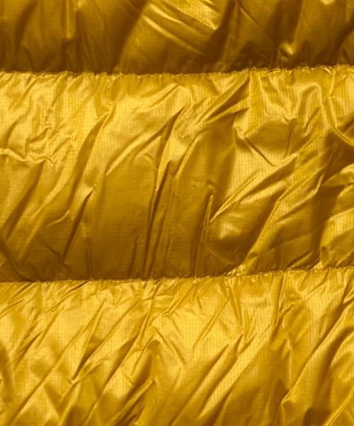 mont-bell（モンベル）mont-bell (モンベル) アルパインダウンパーカ ダウンジャケット イエロー×オレンジ サイズ:Sの古着・服飾アイテム