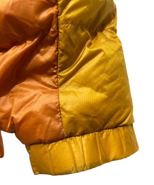 mont-bell（モンベル）mont-bell (モンベル) アルパインダウンパーカ ダウンジャケット イエロー×オレンジ サイズ:Sの古着・服飾アイテム