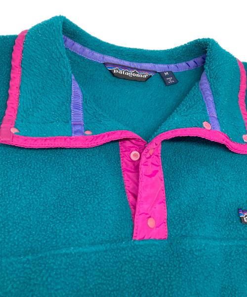 Patagonia（パタゴニア）Patagonia (パタゴニア) シンチラスナップフリースジャケット グリーン×ピンク サイズ:Mの古着・服飾アイテム