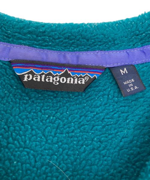 Patagonia（パタゴニア）Patagonia (パタゴニア) シンチラスナップフリースジャケット グリーン×ピンク サイズ:Mの古着・服飾アイテム