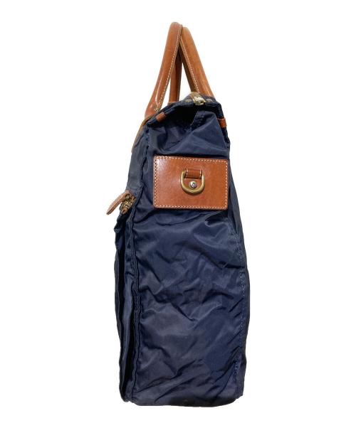 Felisi（フェリージ）Felisi (フェリージ) ナイロンレザーハンドバッグ ブラウン×ネイビーの古着・服飾アイテム