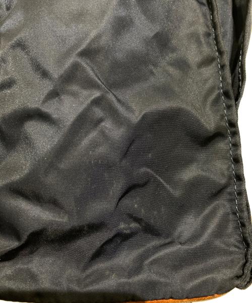 Felisi（フェリージ）Felisi (フェリージ) ナイロンレザーハンドバッグ ブラウン×ネイビーの古着・服飾アイテム