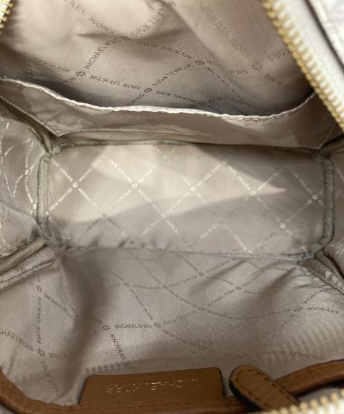 MICHAEL KORS（マイケル・コース）MICHAEL KORS (マイケル・コース) MKモノグラムキルティングリュック ベージュの古着・服飾アイテム