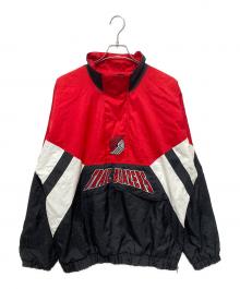 STARTER（スターター）の古着「ナイロンアノラックジャケット」｜レッド