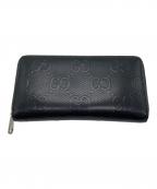 GUCCIグッチ）の古着「GGエンボス ラウンドジップウォレット」｜ブラック