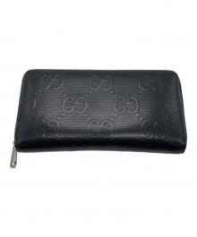 GUCCI（グッチ）の古着「GGエンボス ラウンドジップウォレット」｜ブラック