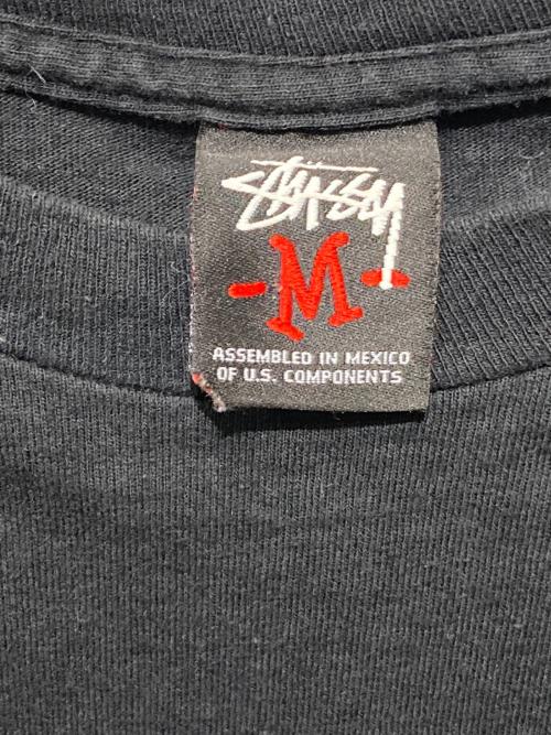 stussy（ステューシー）stussy (ステューシー) POUND (パウンド) グラフィックTシャツ ブラック サイズ:Mの古着・服飾アイテム