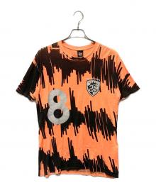 stussy（ステューシー）の古着「プリントTシャツ」｜オレンジ