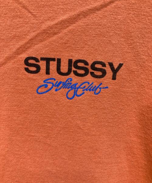 stussy（ステューシー）stussy (ステューシー) プリントTシャツ オレンジ サイズ:Mの古着・服飾アイテム