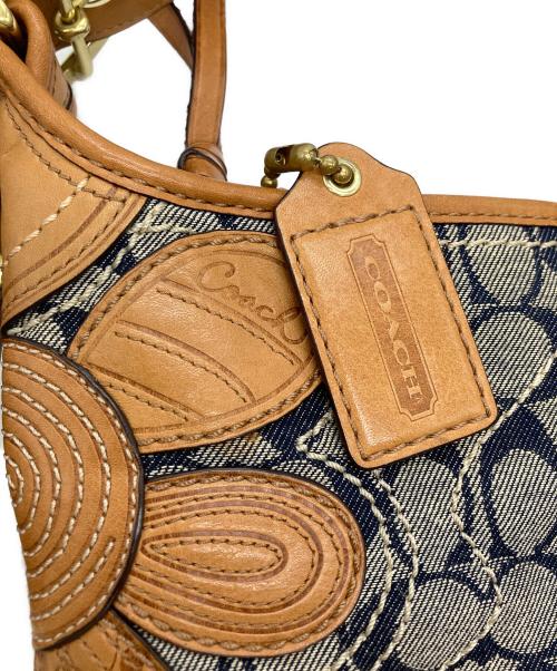 COACH（コーチ）COACH (コーチ) ブリーカー フラワーアップリケ デニムトートバッグ インディゴ サイズ:OneSizeの古着・服飾アイテム