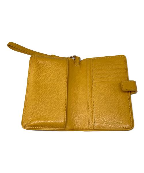 TORY BURCH（トリーバーチ）TORY BURCH (トリーバーチ) スマートフォンウォレットポーチ イエローの古着・服飾アイテム