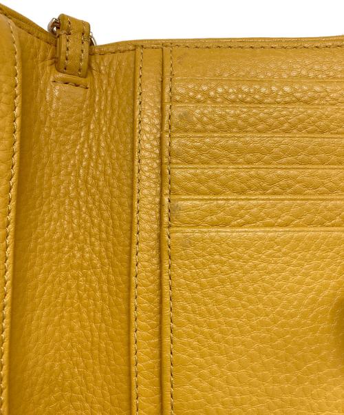 TORY BURCH（トリーバーチ）TORY BURCH (トリーバーチ) スマートフォンウォレットポーチ イエローの古着・服飾アイテム