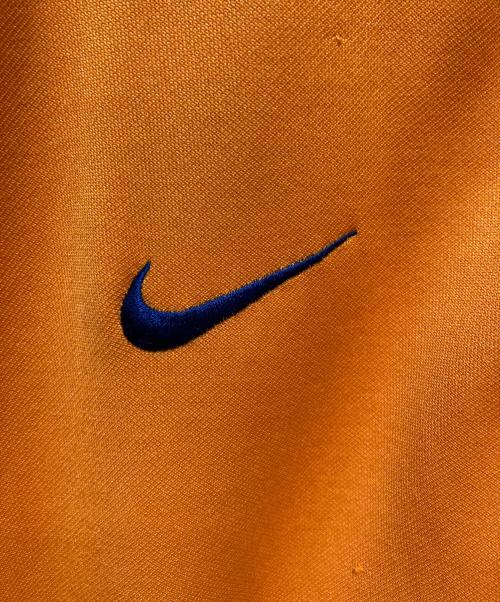 NIKE（ナイキ）NIKE (ナイキ) トラックジャケット オレンジ サイズ:Lの古着・服飾アイテム