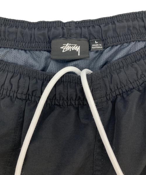 stussy（ステューシー）stussy (ステューシー) CURLY S WATER SHORT / ステゥーシー　カーリー　エス　ウォーター　ショーツ ブラック サイズ:Lの古着・服飾アイテム