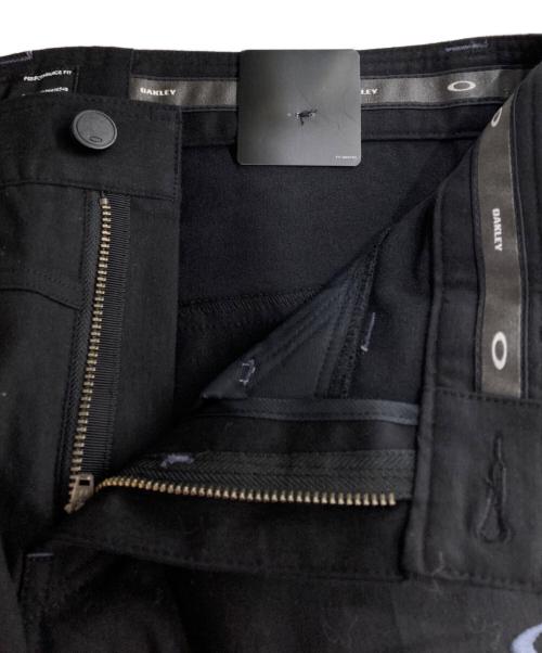OAKLEY（オークリー）OAKLEY (オークリー) SKULLストレッチパンツ ブラック サイズ:W32の古着・服飾アイテム