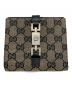 GUCCI（グッチ）の古着「2つ折り財布」｜ブラウン