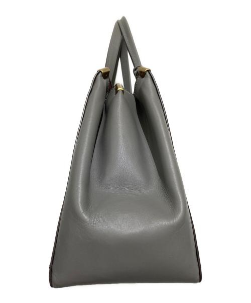 COACH（コーチ）COACH (コーチ) Cooper Carryall With Rivets グレーの古着・服飾アイテム