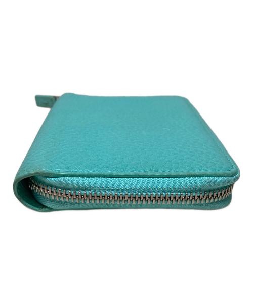 TIFFANY & Co.（ティファニー）Tiffany & Co. (ティファニー) ラウンドファスナー財布 ブルーの古着・服飾アイテム