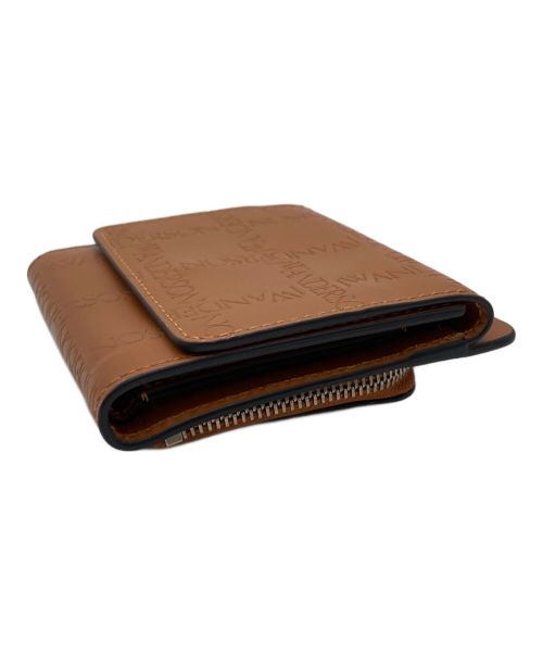 J&M DAVIDSON（ジェイ＆エム デヴィッドソン）J&M DAVIDSON (ジェイ＆エム デヴィッドソン) ストラップミニウォレット ブラウンの古着・服飾アイテム