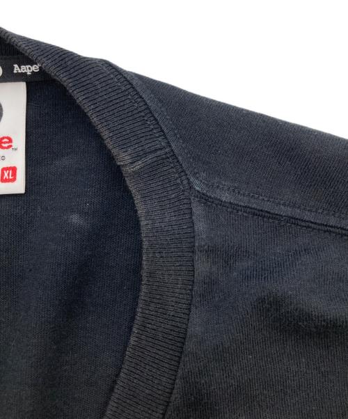 Aape BY A BATHING APE（エーエイプ バイ アベイシングエイプ）Aape BY A BATHING APE (エーエイプ バイ アベイシングエイプ) プリントTシャツ ブラック サイズ:XLの古着・服飾アイテム