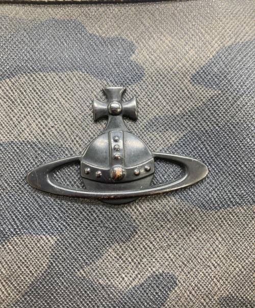 Vivienne Westwood（ヴィヴィアンウエストウッド）Vivienne Westwood (ヴィヴィアンウエストウッド) 迷彩柄 クラッチバッグ カーキの古着・服飾アイテム