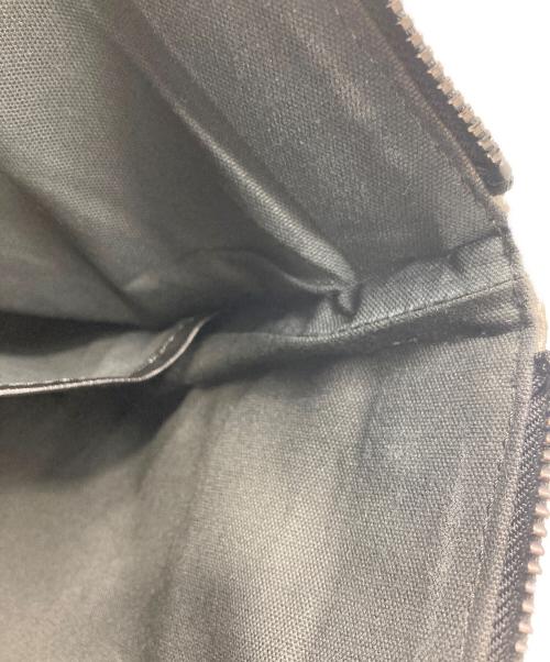 Vivienne Westwood（ヴィヴィアンウエストウッド）Vivienne Westwood (ヴィヴィアンウエストウッド) 迷彩柄 クラッチバッグ カーキの古着・服飾アイテム