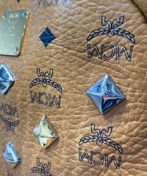 MCM（エムシーエム）MCM (エムシーエム) ヴィセトススタッズパックパック ブラウンの古着・服飾アイテム