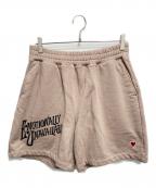 EMOTIONALLY UNAVAILABLEエモーショナリー・アンアベイラブル）の古着「SCRIPT LOGO SWEAT SHORTS」｜ベージュ