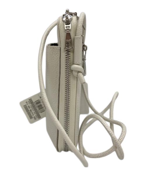 DRESSTERIOR（ドレステリア）DRESSTERIOR (ドレステリア) シュリンクレザー スマホポーチ ホワイト 未使用品の古着・服飾アイテム