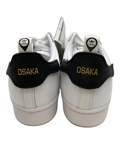 adidas（アディダス）adidas (アディダス) SUPERSTAR 大阪／スーパースター FTWR WHITE/CORE BLACK/GOLD METALLIC ホワイト サイズ:23 未使用品の古着・服飾アイテム