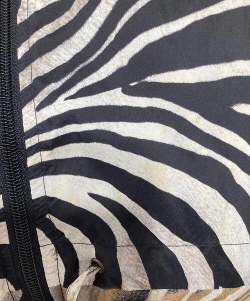 LEONARD paris fuchsia（レオナールパリフューシャ）LEONARD paris fuchsia (レオナールパリフューシャ) アニマルプリントナイロンコート グレー×イエロー サイズ:42の古着・服飾アイテム