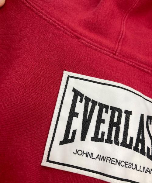 JOHN LAWRENCE SULLIVAN（ジョン ローレンス サリバン）JOHN LAWRENCE SULLIVAN (ジョン ローレンス サリバン) EVERLAST (エバーラスト) コラボプリントプルオーバーパーカー レッド サイズ:Mの古着・服飾アイテム
