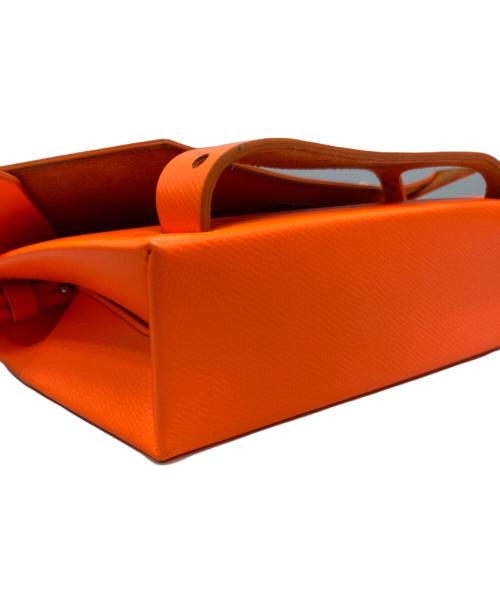 Maison Margiela（メゾンマルジェラ）Maison Margiela (メゾンマルジェラ) SNATCHED スモールチェーンクラッチバッグ オレンジの古着・服飾アイテム