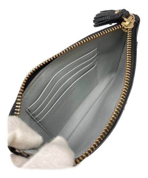 ANYA HINDMARCH（アニヤ・ハインドマーチ）ANYA HINDMARCH (アニヤ・ハインドマーチ) ウォレットポーチ ブラックの古着・服飾アイテム