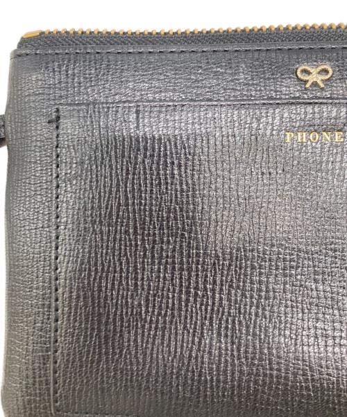 ANYA HINDMARCH（アニヤ・ハインドマーチ）ANYA HINDMARCH (アニヤ・ハインドマーチ) ウォレットポーチ ブラックの古着・服飾アイテム