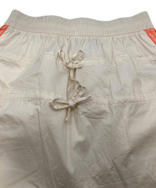 adidas（アディダス）adidas (アディダス) サマーグロー スカート オレンジ×アイボリー サイズ:Sの古着・服飾アイテム