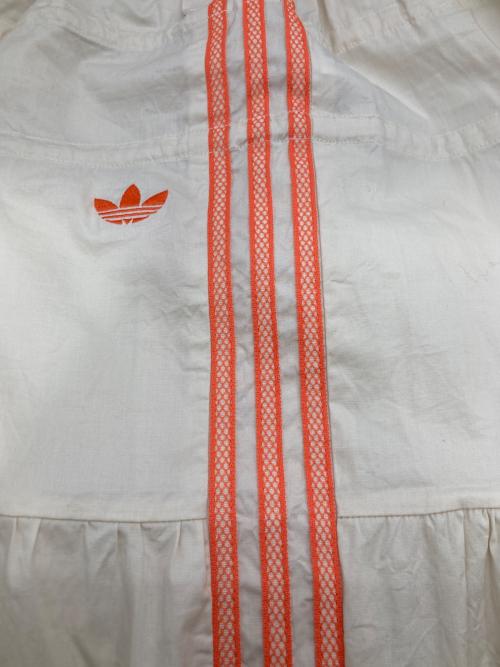 adidas（アディダス）adidas (アディダス) サマーグロー スカート オレンジ×アイボリー サイズ:Sの古着・服飾アイテム