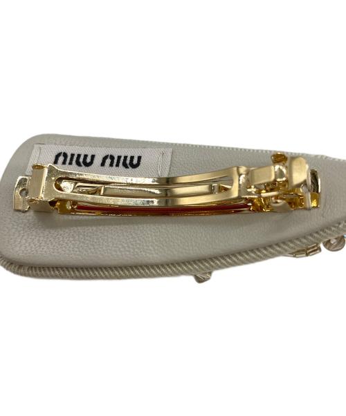 MIU MIU（ミュウミュウ）MIU MIU (ミュウミュウ) 刺繍ギャバジン ヘアクリップ バレッタ アイボリーの古着・服飾アイテム