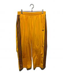 adidas（アディダス）の古着「ベッケンバウアートラックパンツ」｜イエロー