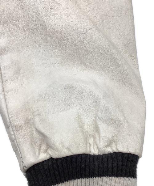 Roots（ルーツ）Roots (ルーツ) ワッペンスタジャン ブラック サイズ:Mの古着・服飾アイテム