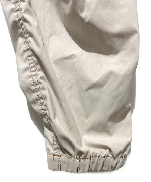 THE NORTH FACE（ザ ノース フェイス）THE NORTH FACE (ザ ノース フェイス) フリーランロングパンツ ベージュ サイズ:Ｌの古着・服飾アイテム