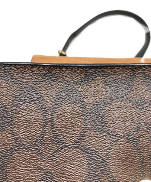 COACH（コーチ）COACH (コーチ) ペッパー サッチェル シグネチャー キャンバス ブラウンの古着・服飾アイテム