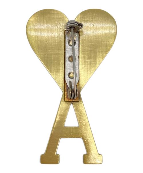 AMI PARIS（アミ パリス）AMI PARIS (アミ パリス) ハートモチーフゴールド ロゴブローチ ゴールドの古着・服飾アイテム