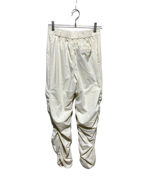 UMBRO（アンブロ）UMBRO (アンブロ) atmos pink (アトモスピンク) Nylon Gather Pants ホワイト サイズ:M 未使用品の古着・服飾アイテム